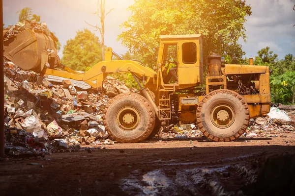 Recycling waste management in the factory with a tractor