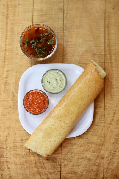Masala dosa , South Indian meal served with sambhar and coconut chutney over,Traditional South Indian rice Dosa , Indian food,Selective focus