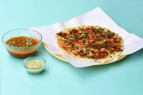 South Indian Food Uttapam Also Known As ooththappam, Rava Uttapam, Uttapa or Uthappa is a Popular South Indian Delicious Spicy Breakfast Snack Served with Coconut Chutney and Sambar