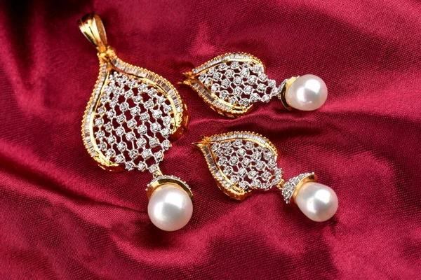 Diamond jewelry placed on cloth with earrings diamond pendant,diamond jewellery