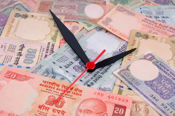 Time is Money,Time and money concept, Indian Currency, Rupee, Indian Rupee,Indian Money, Business, finance, investment, saving and corruption concept - Image