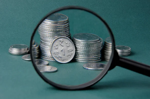 Magnifying glass with indian money, Indian currency,Rupee indian currency,money concept.
