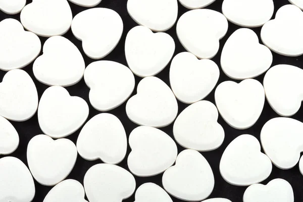 Comprimidos Forma Coração Fundo Preto Medicamentos Que Ajudam Pessoas — Fotografia de Stock