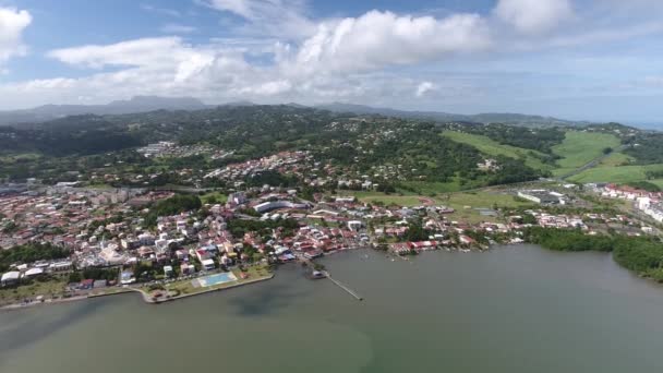 Aerial drone shot over village le robert martinique. Sunny afternoon. — Stock Video