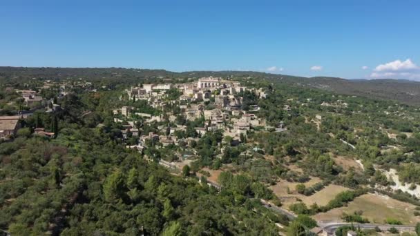 Famous village Gordes natural regional park Luberon aerial view sunny day hotels — Stock Video