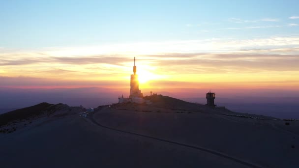 Cinematic sunset aerial view over the Mont Ventoux antenna colorful France — Stock Video