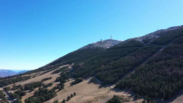 Mont Ventoux north side summit aerial shot fir trees sunny day blue sky Vaucluse — Stock Video