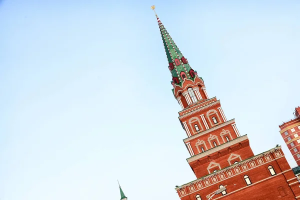 Red brick tower with many window. Old city architecture concept. Spasskaya tower in Yoshkar-Ola in Russia. Photo with Littered the horizon