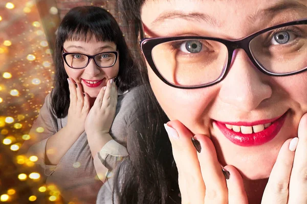 Fat cute woman with glasses and black hair posing in a room decorated for Christmas or New year in Russia