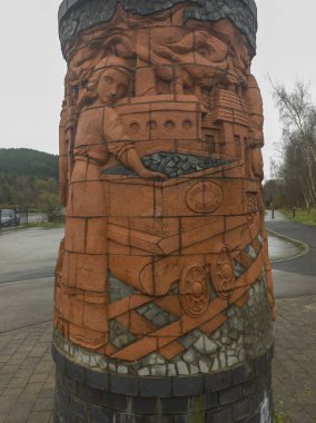 The sculpture commemorates the workers at the old Hafod-Morfa Copperworks established on the site in 1810 in Swansea, Wales clipart