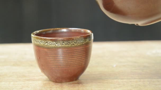 Hot Water Pouring Tea Pot Pottery Glass — Stock Video