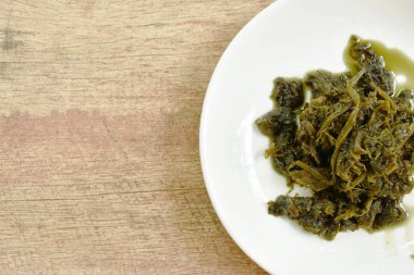  Kızarmış turşusu hardal veya Gan Lan Cai Çin yemeği lahana ve siyah zeytin yağı karıştırın