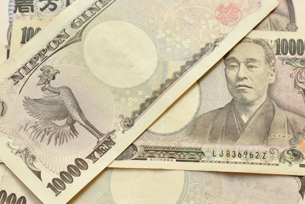 Japanse yen biljet op witte achtergrond — Stockfoto