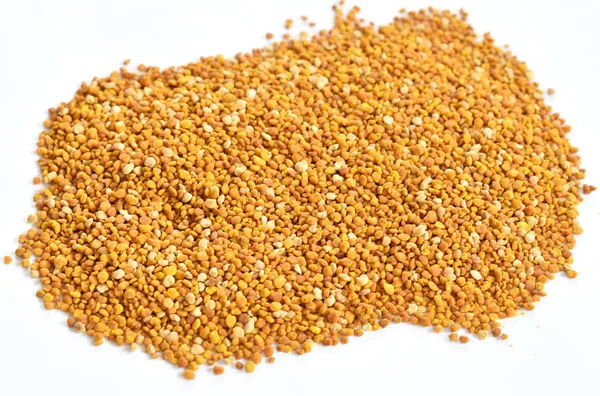 Bee pollen ekologisk mat bakgrund och textur — Stockfoto