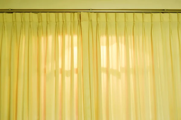 yellow curtain on home door texture and background