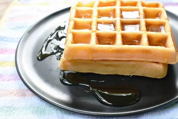 Baked butter waffle dressing honey syrup on plate — Stock Photo, Image