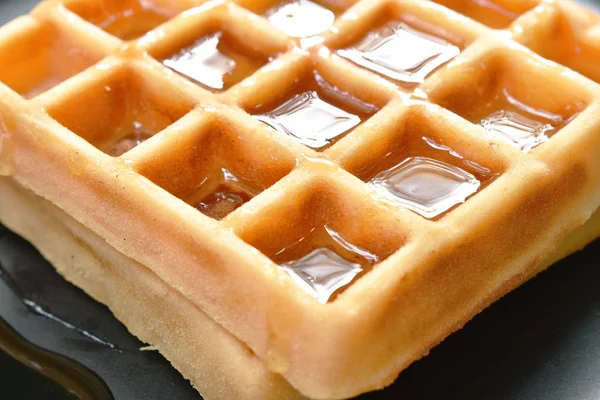 Baked butter waffle dressing honey syrup on plate — Stock Photo, Image