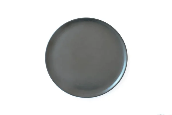 Top view of black plate on white background — Stock Photo, Image