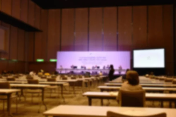 blur of stage and people meeting  in conference room