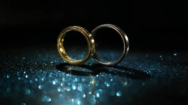 Two Ring Blue Glitter Dark Background Royalty Free Stock Photos