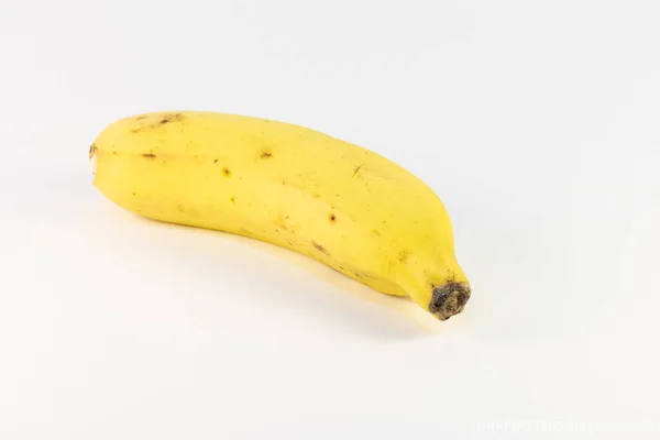 Uma Banana Amarela Real Com Fundo Branco — Fotografia de Stock