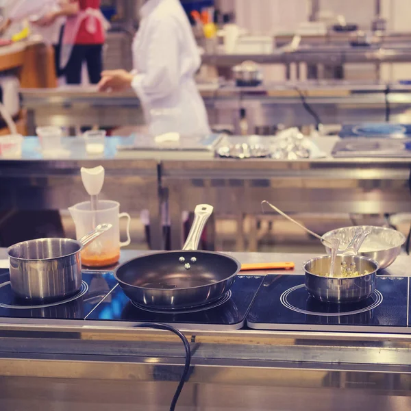 Cooking in the kitchen of restaurants and cafes using electric stoves