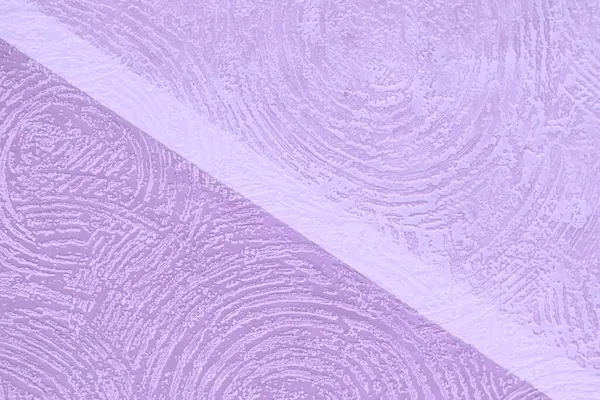 Background light purple uneven surface with ornament in the form of an abstract circle. Texture with separating line