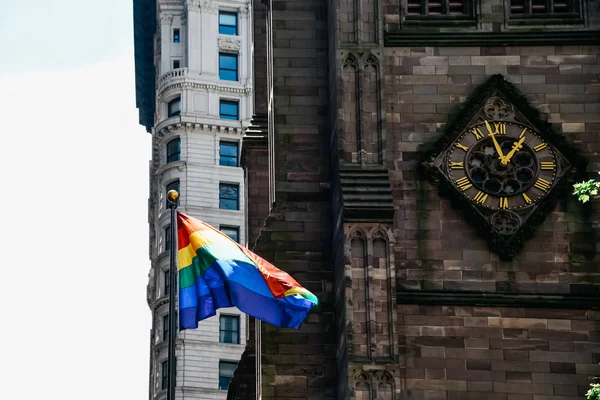 Rainbow flag in Trinity Church in Financial district of New York