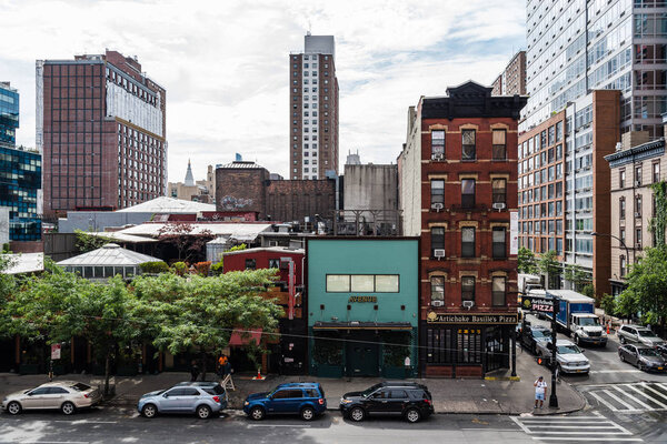New York City, USA - June 22, 2018: View of Chelsea from High Line. The High Line is an elevated linear park, greenway and rail trail. It was created on a former New York Central Railroad spur