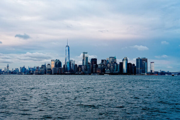 Skyline and waterfront of Downtown of New York City at sunset