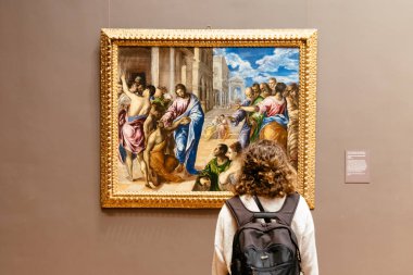 Woman looking at painting at Metropolitan Museum of Art clipart