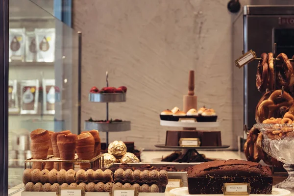 Hipster bakery with different kinds of sweets — Stock Photo, Image