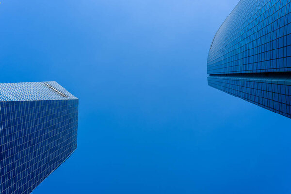 Madrid, Spain - June 14, 2020: Skyscrapers against blue sky in Four Towers Business Area.