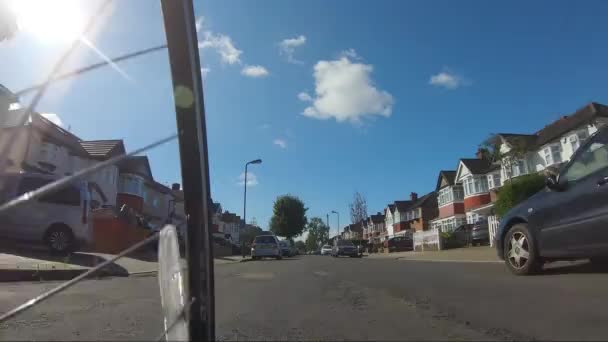 Low Angle Pov Ciclismo Por Calle Pasado Coches Aparcados Ciudad — Vídeos de Stock