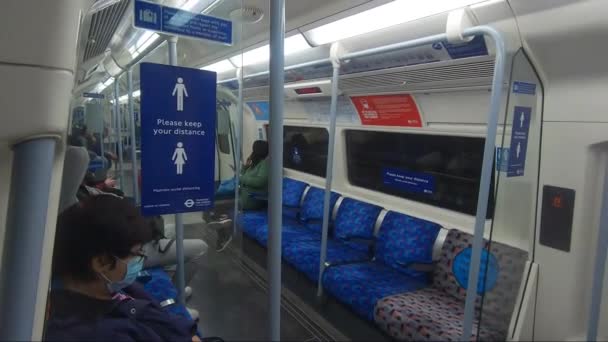 Passengers Jubilee Line Train Social Distance Seating Wearing Face Masks — Stock Video