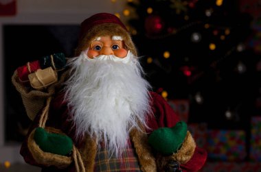 Aydınlatma bir arka plan üzerinde Noel Baba