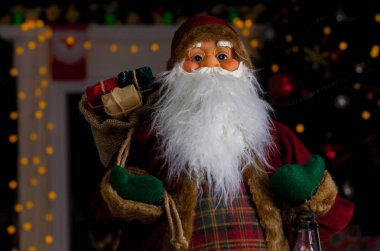 Aydınlatma bir arka plan üzerinde Noel Baba