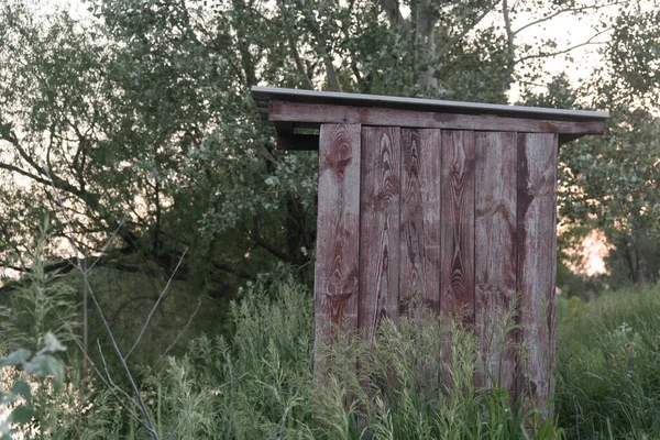 Old wooden double outhouse in the remote Russian village in the summer — Stock Image Old Wooden Double Outhouse Remote Russian Village Summer Royalty Free Stock Photos