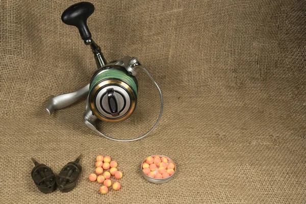 Boilies, fishing baits,carp reel with fishing close up, Fishing baits for carp. Baits for carp.