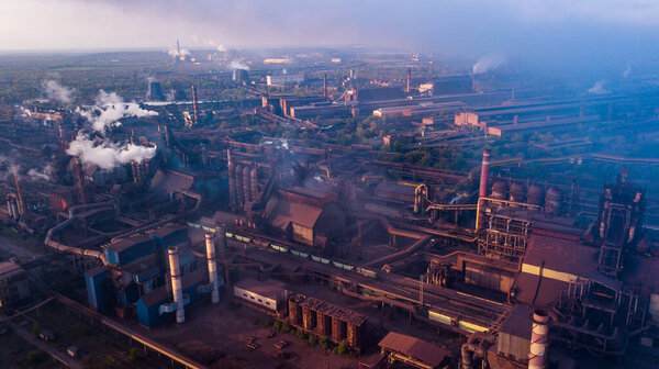 industry metallurgical plant dawn smoke smog emissions bad ecology aerial photography