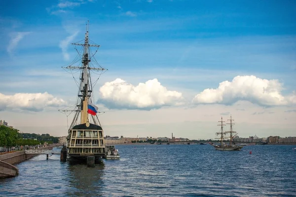 the ship the flying Dutchman on the river on background sky with clouds