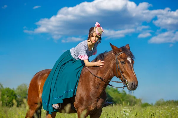 beautiful aristocrat in a dress on a horse