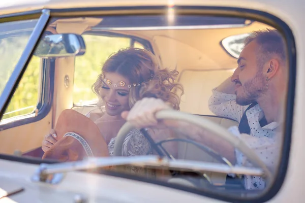 beautiful young couple sitting in car romantic relationship