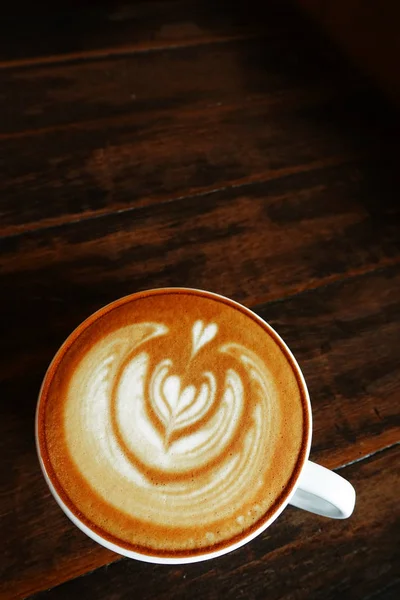 Una Taza Café Latte Arte Sobre Fondo Madera — Foto de Stock