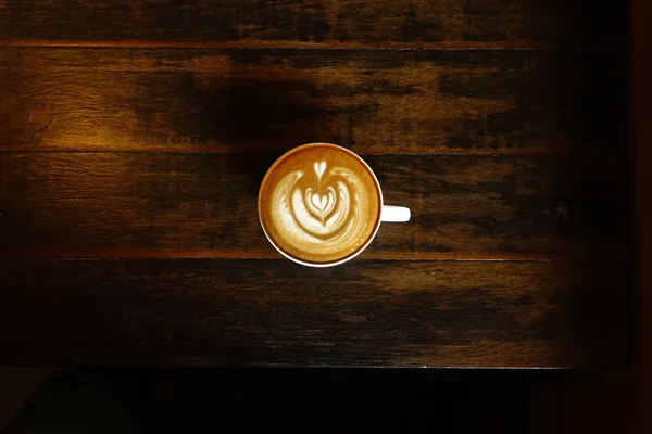 Una Taza Café Latte Arte Sobre Fondo Madera — Foto de Stock