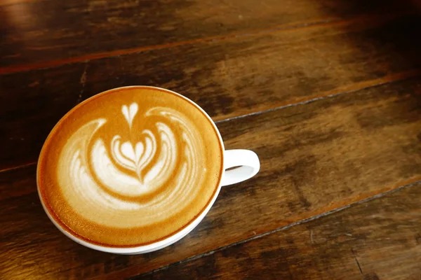 Una Taza Café Latte Arte Sobre Fondo Madera — Foto de Stock