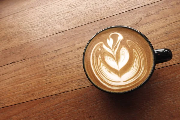 Una Taza Café Latte Arte Sobre Fondo Madera — Foto de Stock