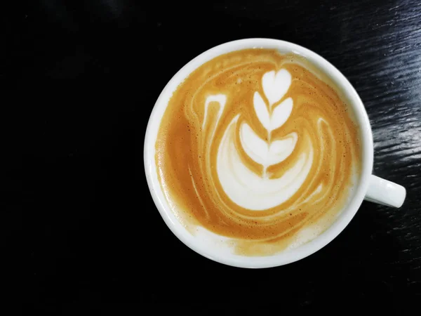 Una Taza Café Latte Arte Sobre Fondo Madera —  Fotos de Stock