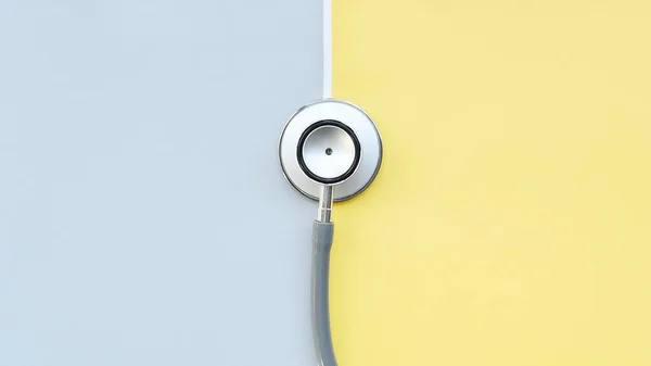 Nahaufnahme Des Stethoskops Auf Gelbem Und Grauem Hintergrund — Stockfoto