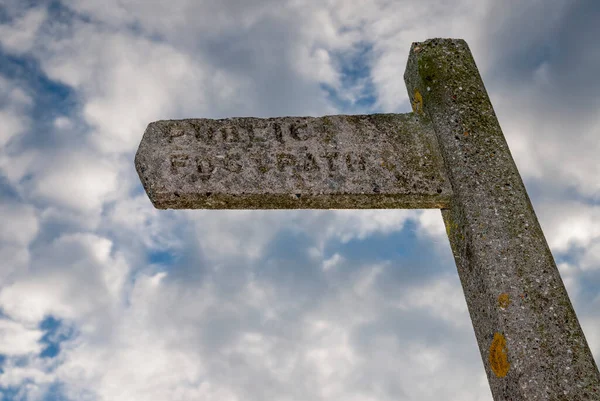 Public Footpath Sign with Blue Sky